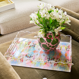 Colorful print acrylic tray with scalloped edges.